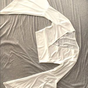 A white polyester crop top